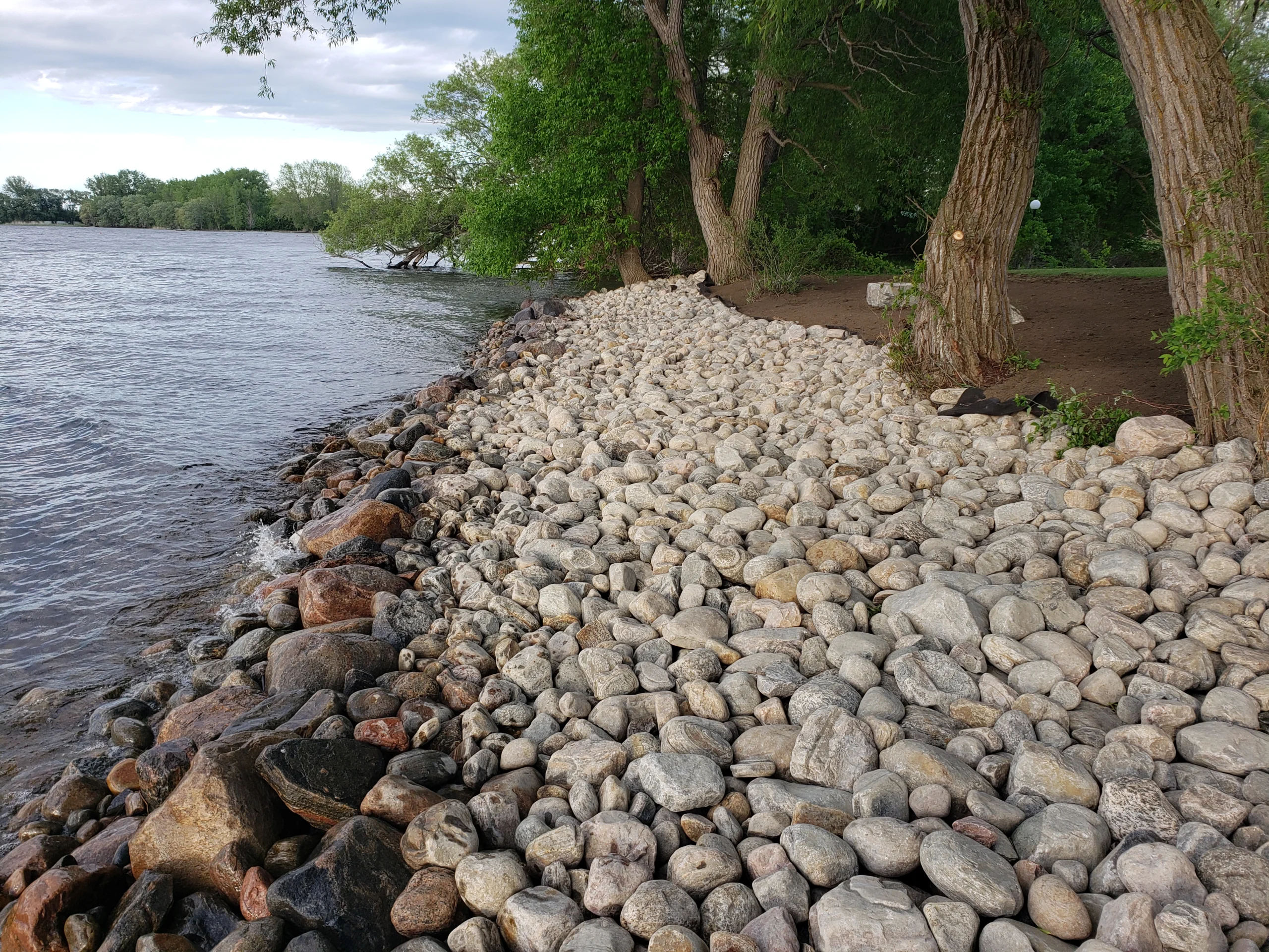 Armour stone shoreline protecting a waterfront property