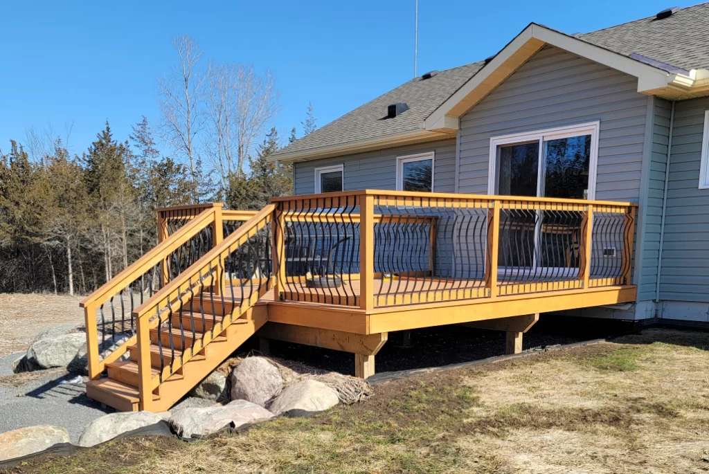 Wood deck with railing and stairs