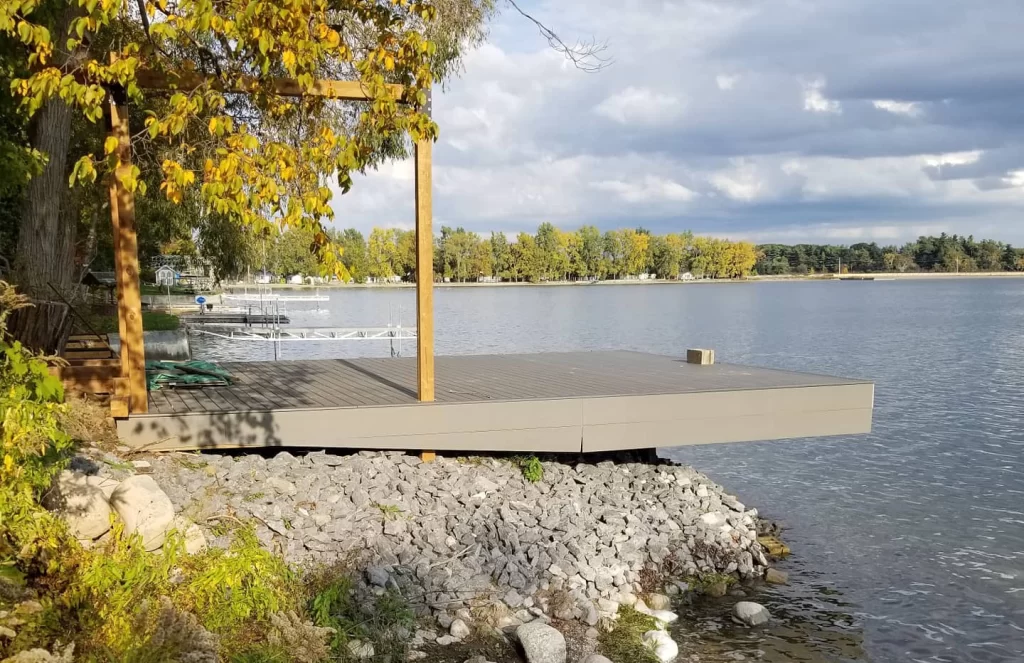 Dock and watercraft lift at the water