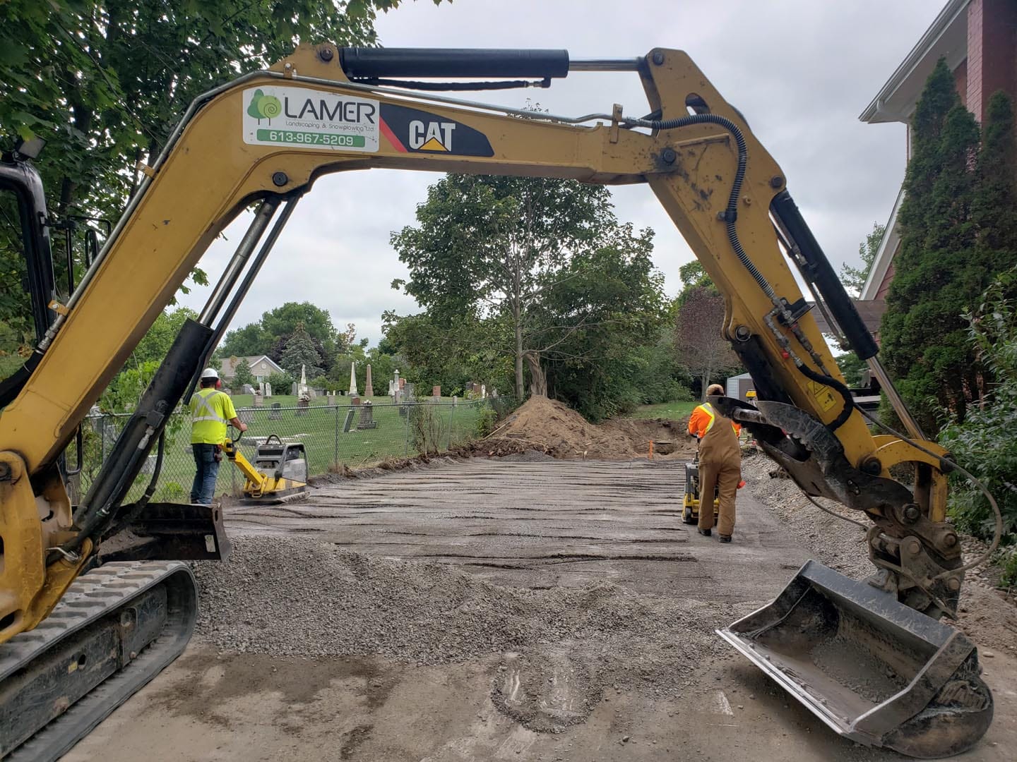 Excavator digging on a residential site