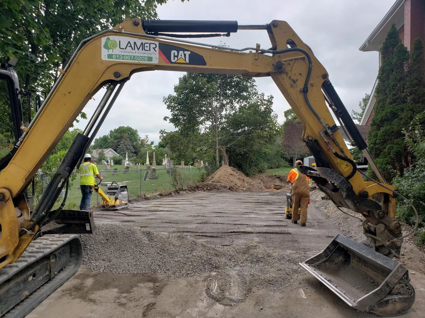 Excavator digging on a residential site